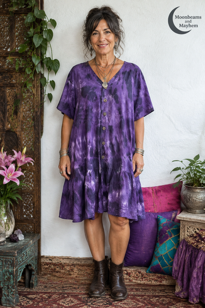 Woman wearing the Violet Moon purple tie-dye button-through tunic dress