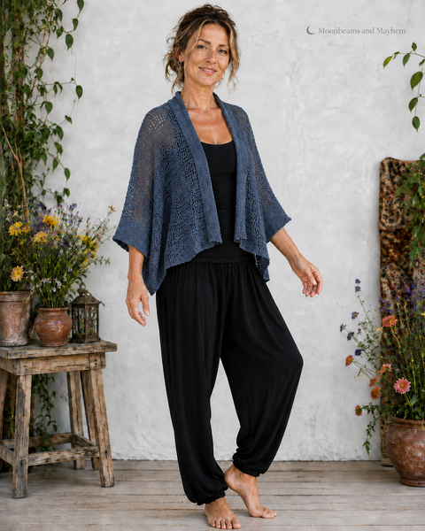 Three-quarter view of the petrol blue waterfall kimono showing its relaxed drape