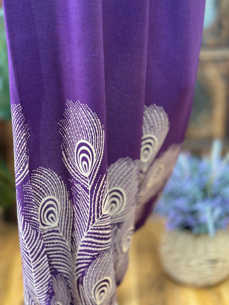 Close-up showing the smooth lightweight purple rayon fabric