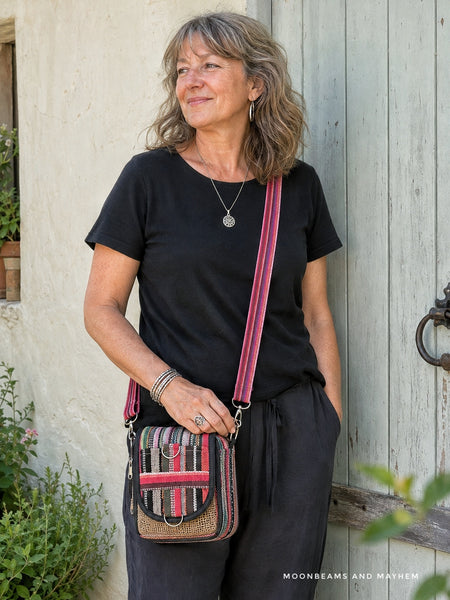 Woman wearing the Wandering Spirit patchwork bag across her body