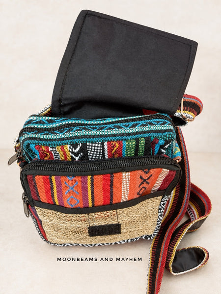 Rose Mix crossbody bag open to show its zipped compartments