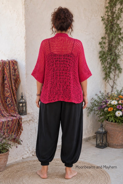 Back view of woman wearing the Wild Rose waterfall kimono
