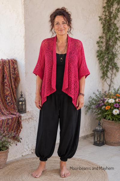 Woman wearing the Wild Rose berry-pink waterfall kimono